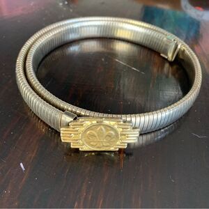 Vintage womans Gold Coil Waist Belt Stretch Belt 26-32” with Fleur-de-Lis Buckle
